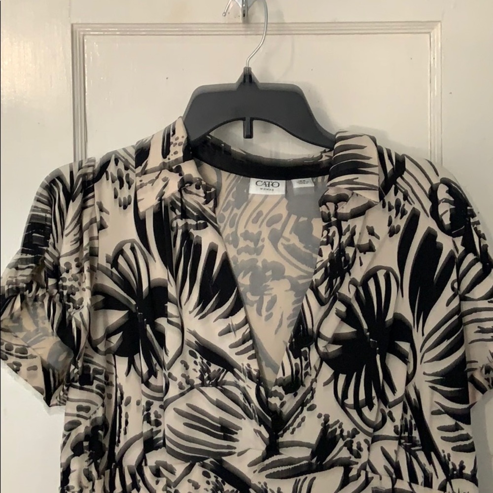 patterned black/white dress with belt loops.